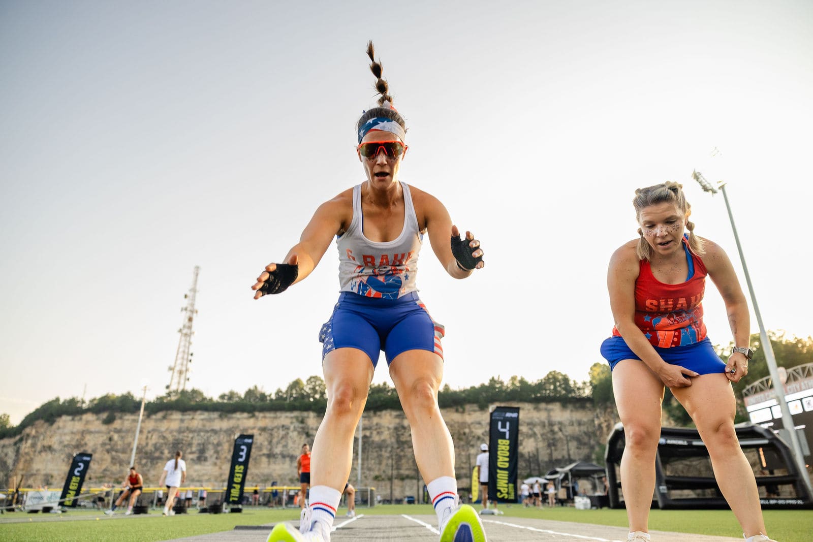 An athlete celebrating mid-race in the ROX ZONE